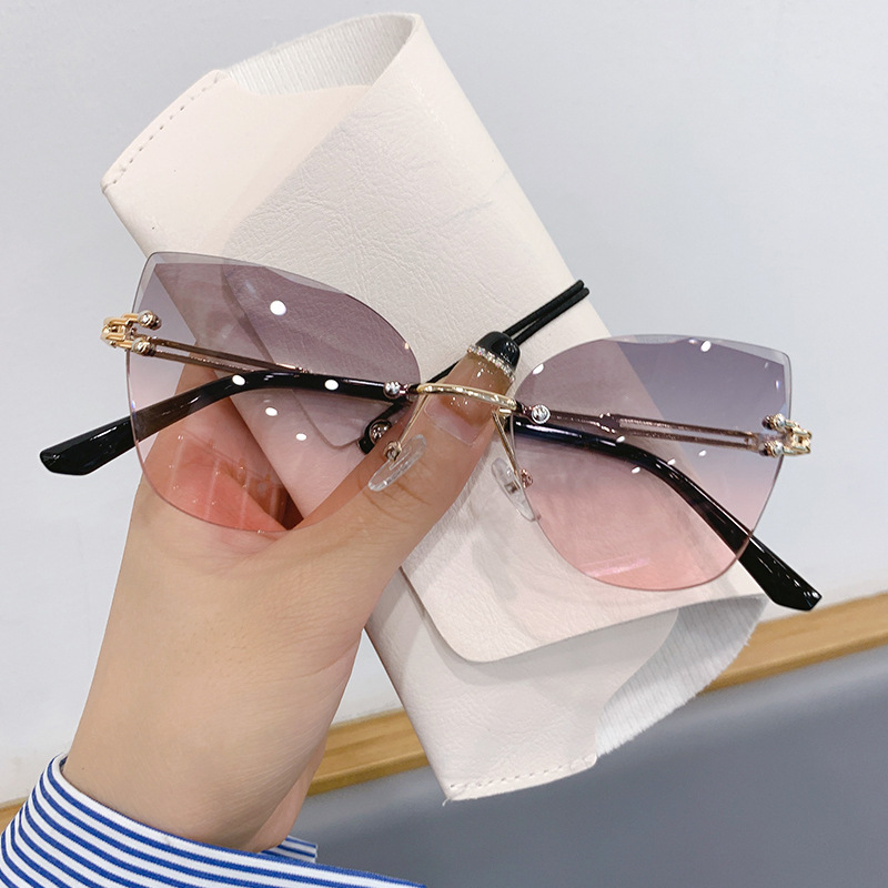 Cross-border in stock new frameless trim sunglasses fashion cat’s eye gradient sunglasses Europe and the United States retro Internet red explosions